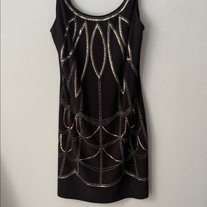 Bisou Bisou Black Dress with Gold Accents
